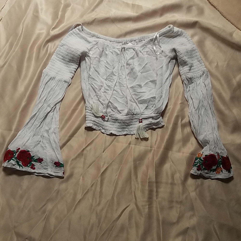 Festival season off-the-shoulder embroidered top
